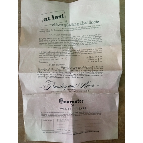 245 - A six service silver plated canteen of cutlery set by Priestly and Moore in an art deco wooden box.