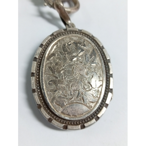 328 - An antique Victorian collar necklace and pendant engraved with a bird and floral patterns. Length 20... 