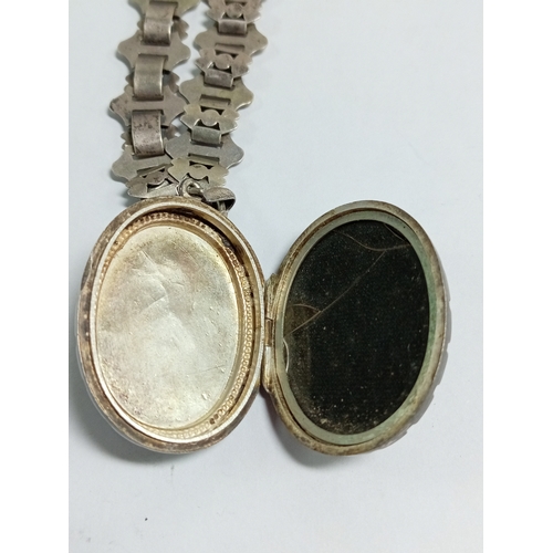 328 - An antique Victorian collar necklace and pendant engraved with a bird and floral patterns. Length 20... 