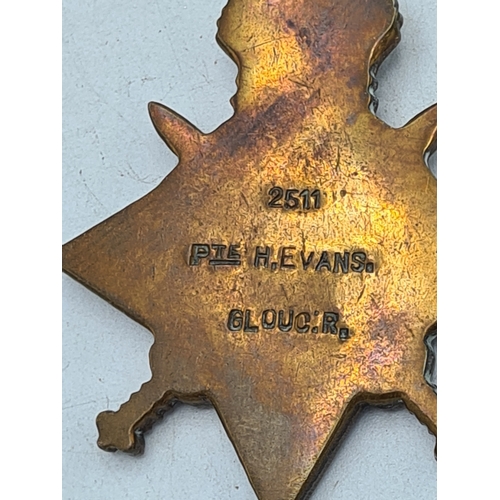 249 - A trio of WW1 medals to include 1915 star, war and victory medals. Harry Evans, 2511, 1/5th Gloucest... 