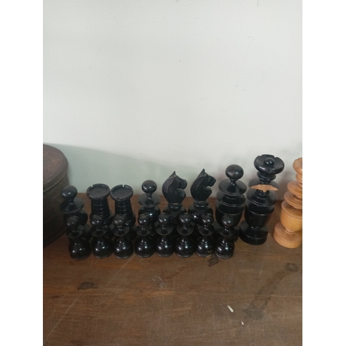 26 - Hand Carved Chess 32 Piece Set Wooden in a Vintage Tin

General Wear & Tear. 1 Piece has noticable d... 