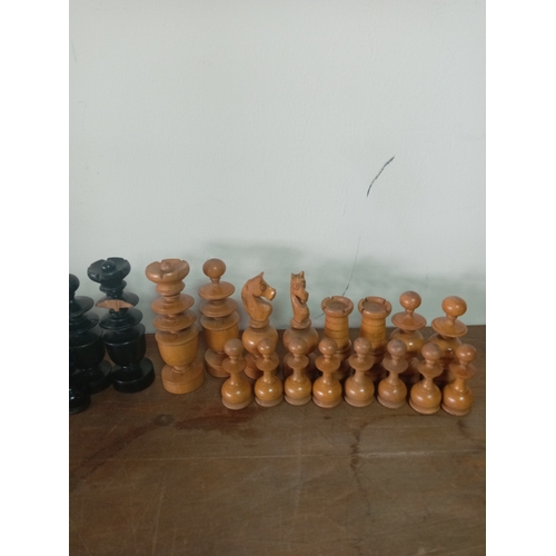 26 - Hand Carved Chess 32 Piece Set Wooden in a Vintage Tin

General Wear & Tear. 1 Piece has noticable d... 