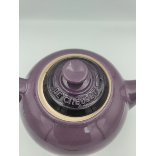 33 - A Le Creuset purple teapot 1.3 L.