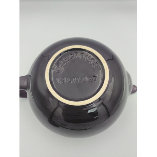 33 - A Le Creuset purple teapot 1.3 L.