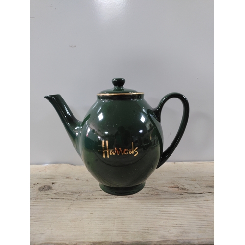 34 - A Harrods tea for 2 set To include 1 teapot, 2 teacups & a saucer.