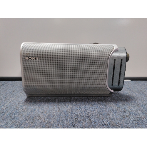 36 - A collection of 2 Tilley paraffin lamps, A vintage real hide triple hip flask, & A Sony portable rad... 