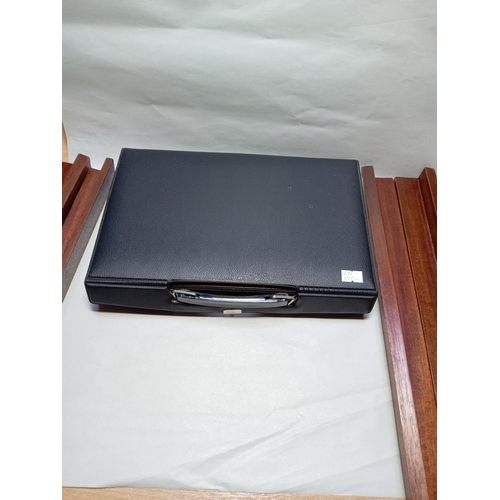 50 - A complete Mah-Jongg set to include chips and carry case, dice, score counter, instructions and piec... 