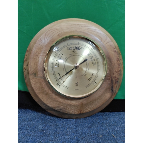 53 - A pair of wooden barometers