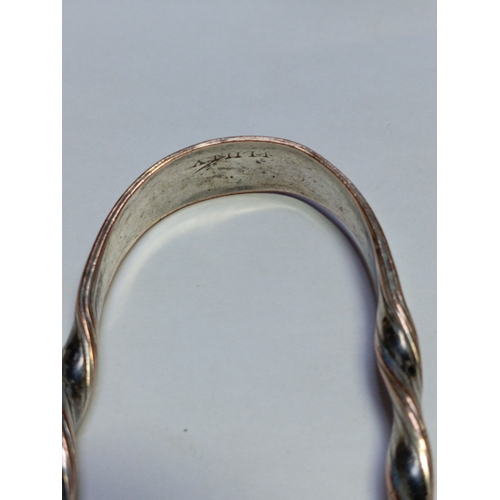 58 - A pair of Georgian 1790 Sheffield plate sugar tongs.