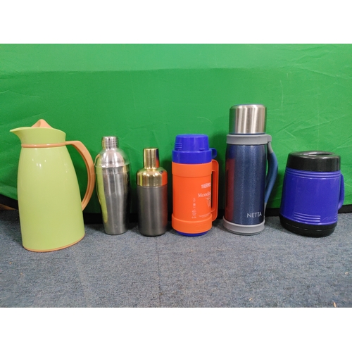 59 - A collection of flasks, decanters and 2 Royal Worcester plates and a Laverswall fine china plate. To... 