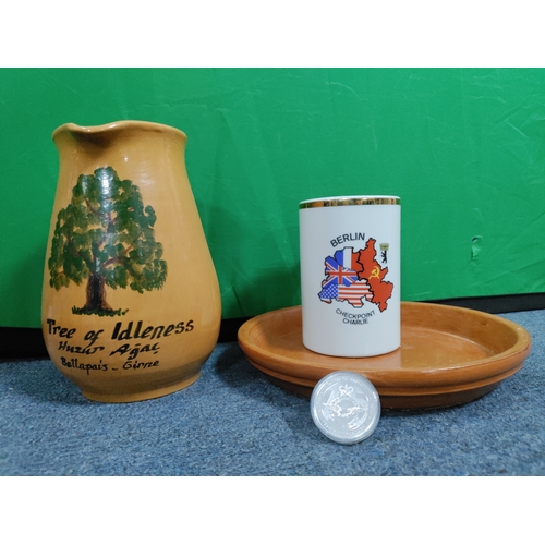 59 - A collection of flasks, decanters and 2 Royal Worcester plates and a Laverswall fine china plate. To... 