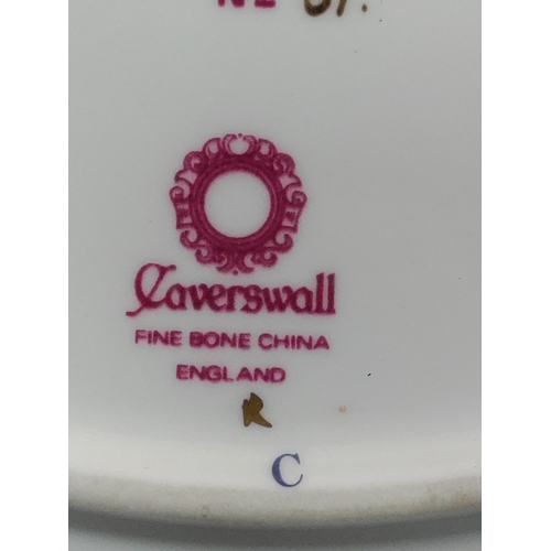 59 - A collection of flasks, decanters and 2 Royal Worcester plates and a Laverswall fine china plate. To... 