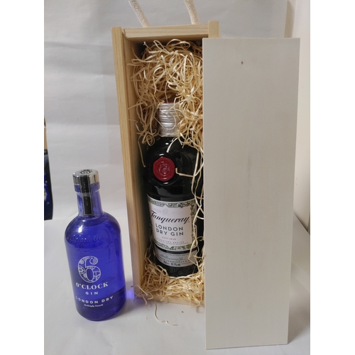 251 - Two bottles of Gin, to Include; one bottle of 6 o'clock London Dry Gin, and one bottle of Tanqueray ... 