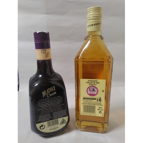 252 - Two bottles of alcohol, to include; a bottle of Heather Cream Liqueur (Scotland), and a bottle of St... 