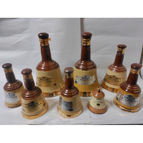 261 - A Collection of eight Bell's Blended Scotch Whisky in Ceramic bottles (varying sizes) - Mostly Broke... 