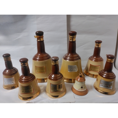 261 - A Collection of eight Bell's Blended Scotch Whisky in Ceramic bottles (varying sizes) - Mostly Broke... 