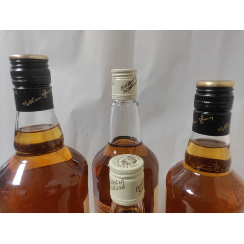 268 - Four bottles of 'The Famous Grouse' Scotch Whisky; Two 1 L bottles, one 35 cl bottle (boxed), and on... 