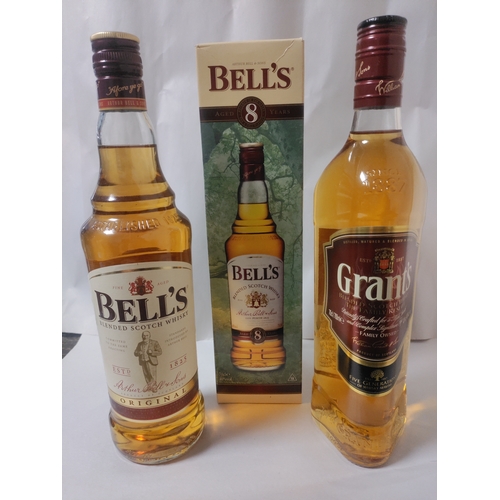 269 - Three bottles of Blended Scotch Whisky, to include; One Bell's Original (unboxed) , one Bell's Aged ... 