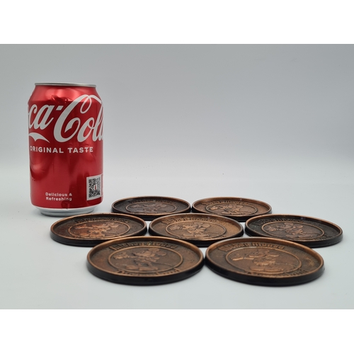 6 - A set of 7 vintage Mickey Mouse Disneyland Brass coloured metal coasters. Made by Century of Canada.... 