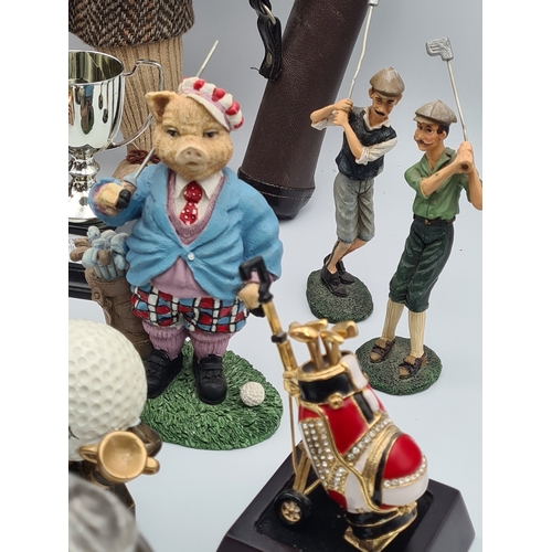 8 - A collection of Golf related memorabilia to include trophy's; ornaments, a golfing Owl, a St Andrews... 