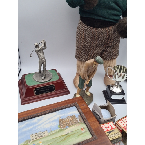 8 - A collection of Golf related memorabilia to include trophy's; ornaments, a golfing Owl, a St Andrews... 