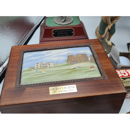 8 - A collection of Golf related memorabilia to include trophy's; ornaments, a golfing Owl, a St Andrews... 