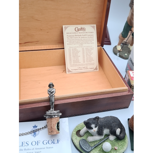 8 - A collection of Golf related memorabilia to include trophy's; ornaments, a golfing Owl, a St Andrews... 
