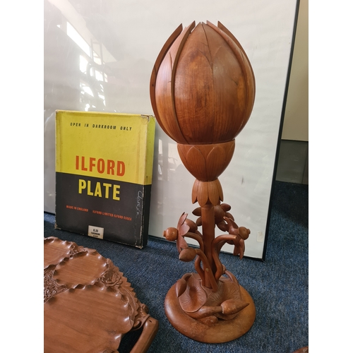 12 - A job lot of mainly wooden ethnic items to include: a carved statue; a carved mask; a carved tray; a... 