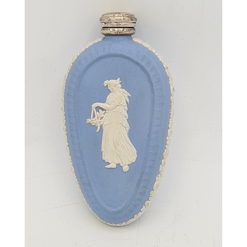 248 - A rare Wedgwood Blue Jasperware perfume scent bottle with Silver lid. Silver is marked.