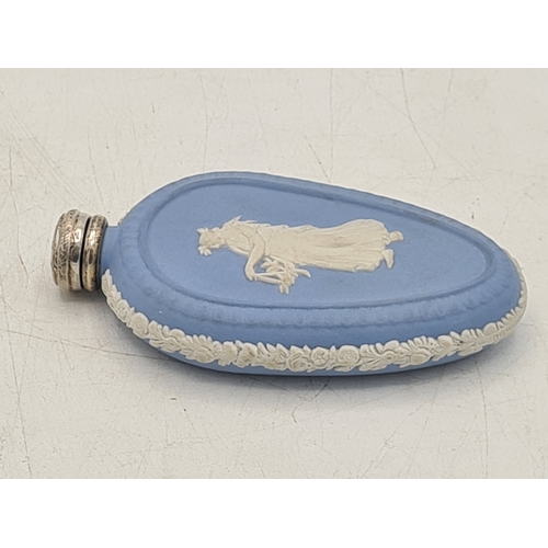 248 - A rare Wedgwood Blue Jasperware perfume scent bottle with Silver lid. Silver is marked.