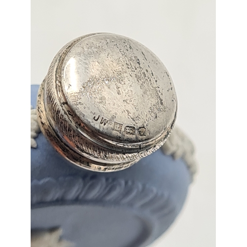 248 - A rare Wedgwood Blue Jasperware perfume scent bottle with Silver lid. Silver is marked.