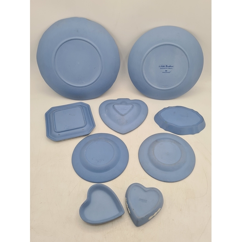 246 - A collection of 8 pieces of Wedgwood Jasperware in Blue. Includes a 1982 Christmas plate; a plate wi... 