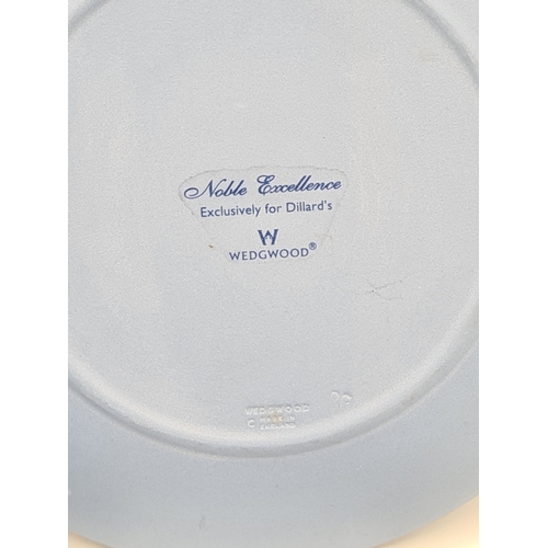 246 - A collection of 8 pieces of Wedgwood Jasperware in Blue. Includes a 1982 Christmas plate; a plate wi... 