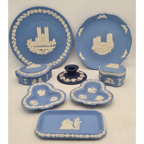 245 - A collection of 8 pieces of Wedgwood Jasperware in Blue. Includes a 1977 plate; a 1980 plate; 2 lidd... 
