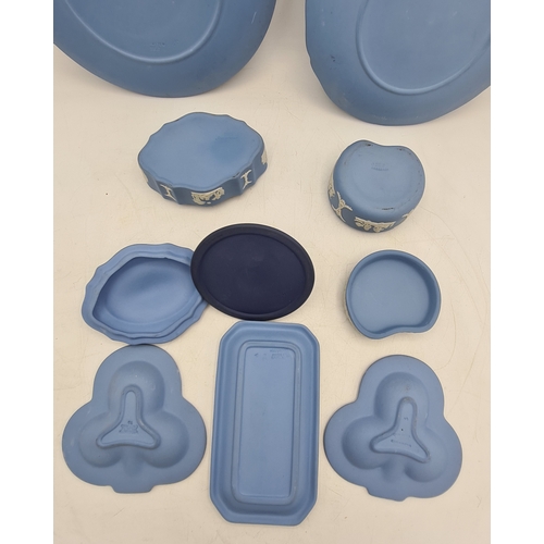 245 - A collection of 8 pieces of Wedgwood Jasperware in Blue. Includes a 1977 plate; a 1980 plate; 2 lidd... 