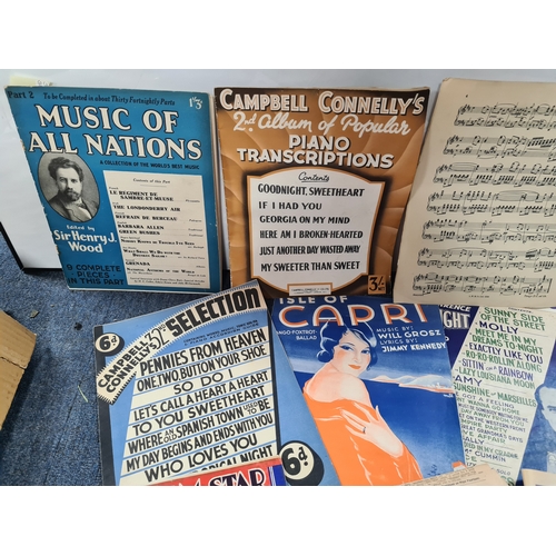 44 - A collection of Ephemara to include music score sheets, a Newspaper special on Princess Diana, postc... 
