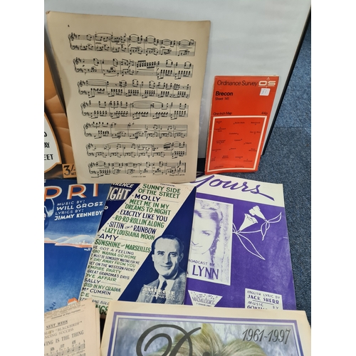 44 - A collection of Ephemara to include music score sheets, a Newspaper special on Princess Diana, postc... 