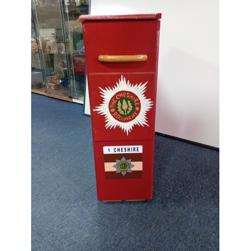 49 - A tall cerise storage box 'The Cheshire Regiment'

Height 57cm 
Width 19.2 cm 
Length Sideways 61cm