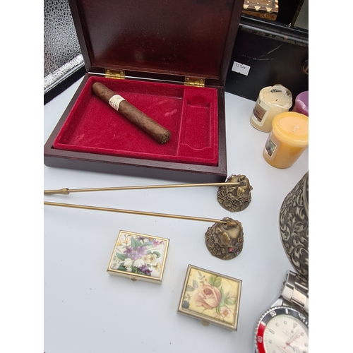 52 - A job lot of small items housed in a large black cash box (no key), items include clocks, various bo... 