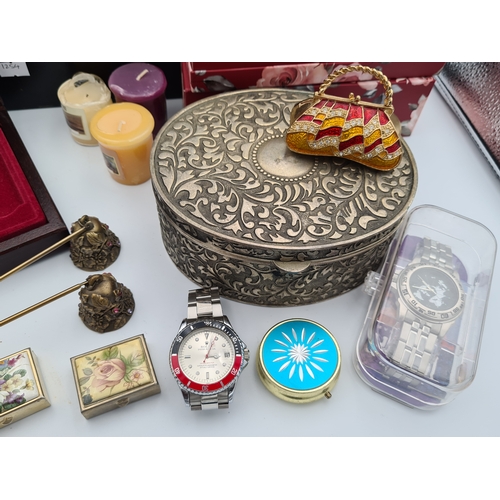 52 - A job lot of small items housed in a large black cash box (no key), items include clocks, various bo... 