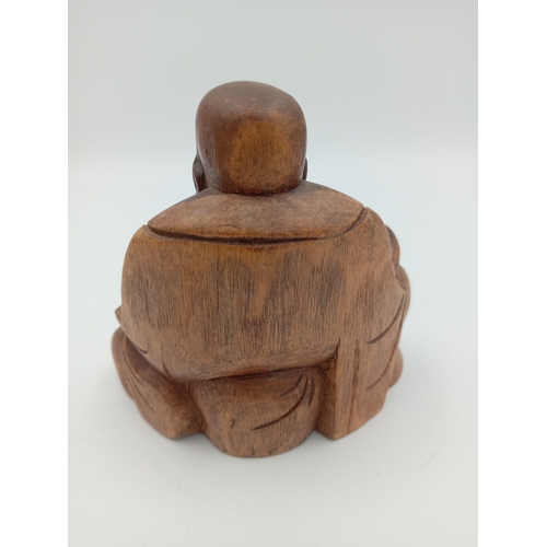 54 - A vintage carved wooden Buddah