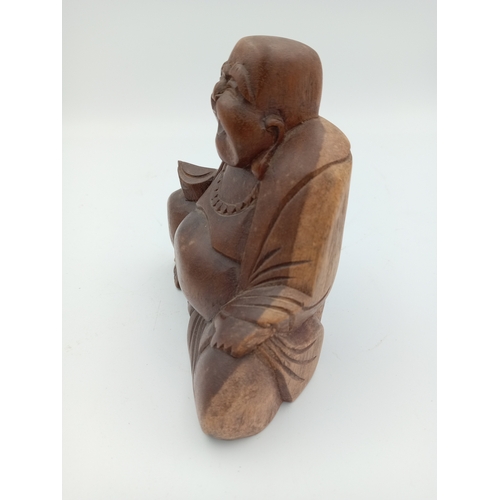 54 - A vintage carved wooden Buddah