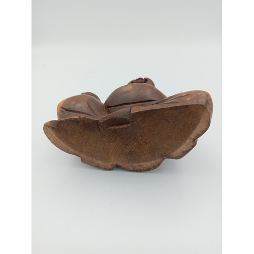 54 - A vintage carved wooden Buddah