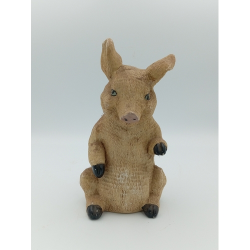58 - A box full of pig figurines. Including a large collection of pig figures including a figure of 3 pig... 