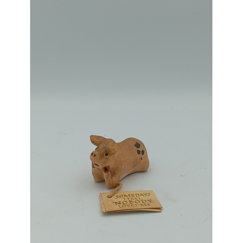 58 - A box full of pig figurines. Including a large collection of pig figures including a figure of 3 pig... 