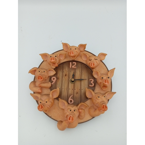 58 - A box full of pig figurines. Including a large collection of pig figures including a figure of 3 pig... 