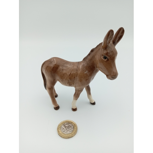 231 - A 'Beswick' Ceramic Donkey