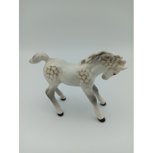 230 - A white 'Beswick' Ceramic Horse
