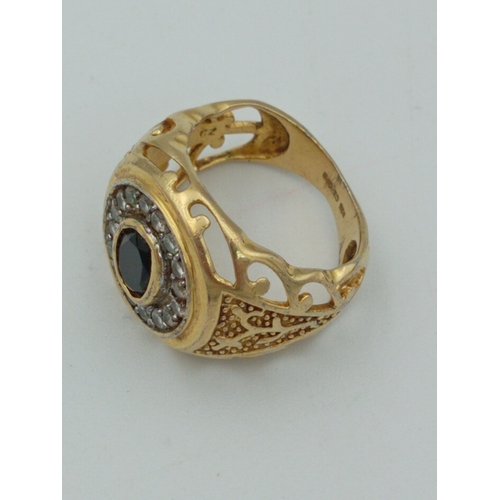 363 - A stamped 925 silver CZ Gold plated ring with black stone size N