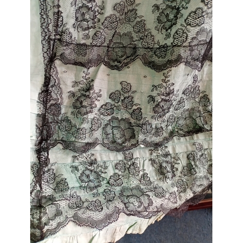 215 - An Antique Victorian skirt with black lace work and bows